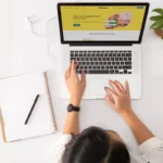A person using email marketing automation tool on his laptop to target his audience