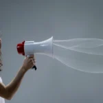 Wavy Haired Woman Holding a Megaphone